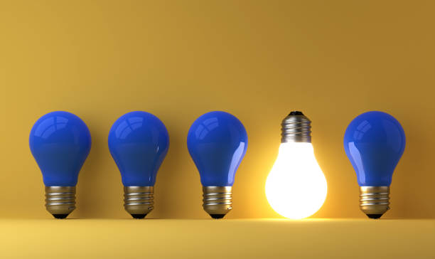 istock old classic light bulb in front of background 1357094158