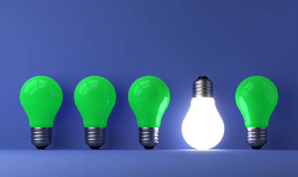 istock old classic light bulb in front of background 1357094161