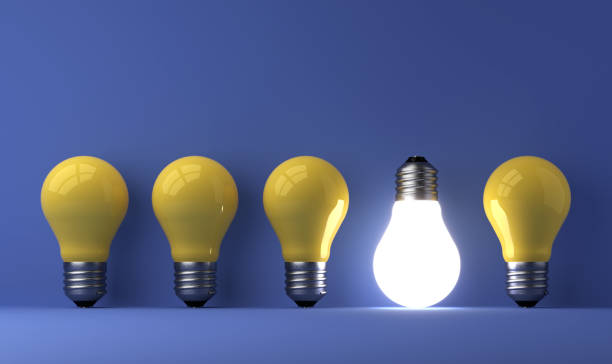 istock old classic light bulb in front of background 1357094169
