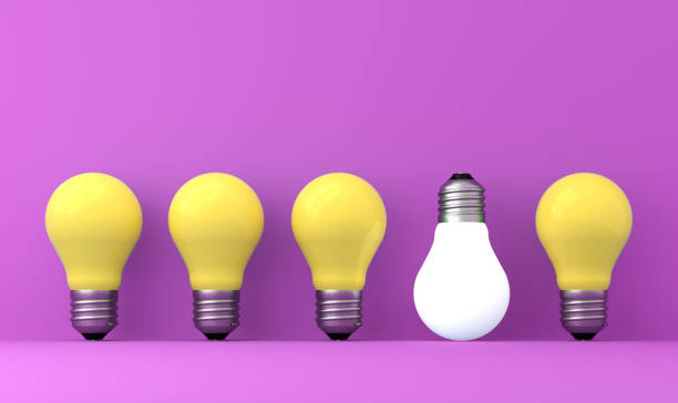 istock old classic light bulb in front of background 1357094171