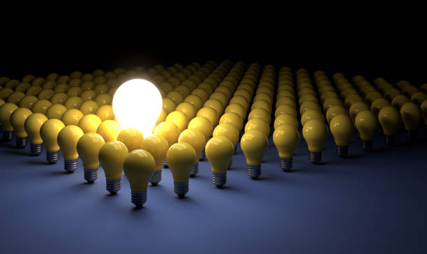 istock old classic light bulb in front of background 1357094211