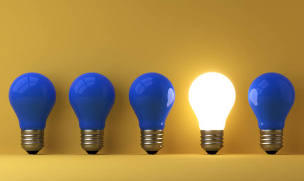 istock old classic light bulb in front of background 1357094858