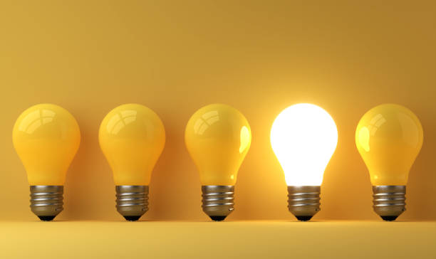 istock old classic light bulb in front of background 1357094860