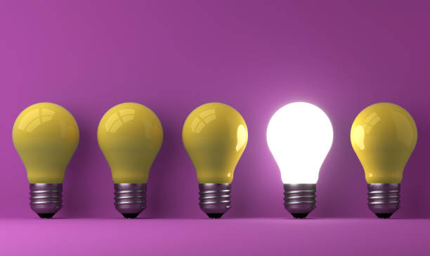 istock old classic light bulb in front of background 1357094947