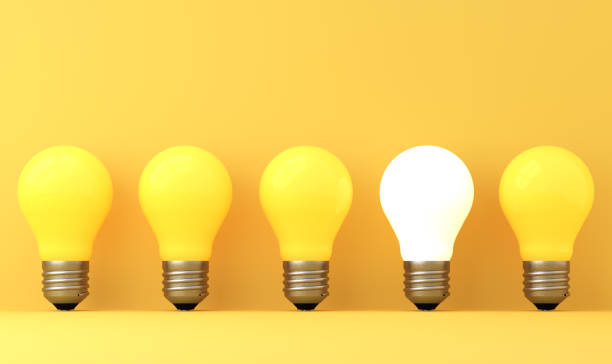 istock old classic light bulb in front of background 1357094948