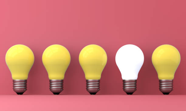 istock old classic light bulb in front of background 1357094949