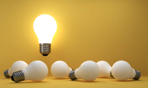 istock old classic light bulb in front of background 1357095188