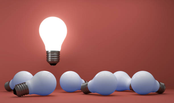 istock old classic light bulb in front of background 1357095290