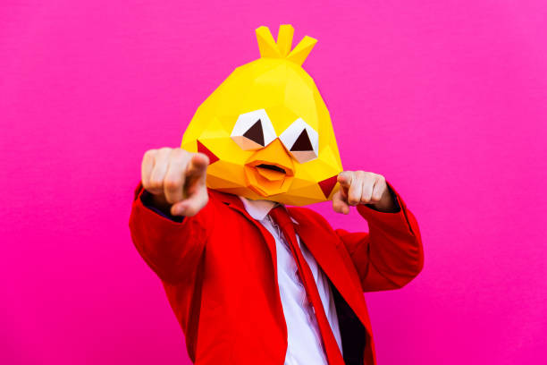 istock Cool man wearing 3d origami mask 1357096686