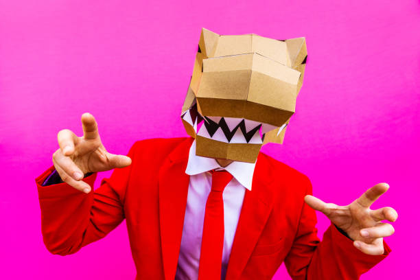 istock Cool man wearing 3d origami mask 1357097779