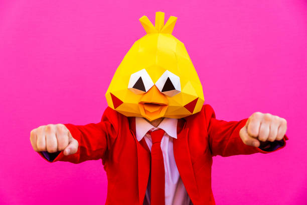 istock Cool man wearing 3d origami mask 1357097990