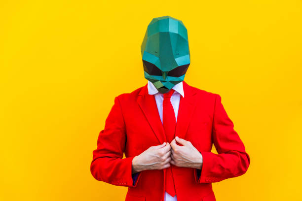 istock Cool man wearing 3d origami mask 1357098042