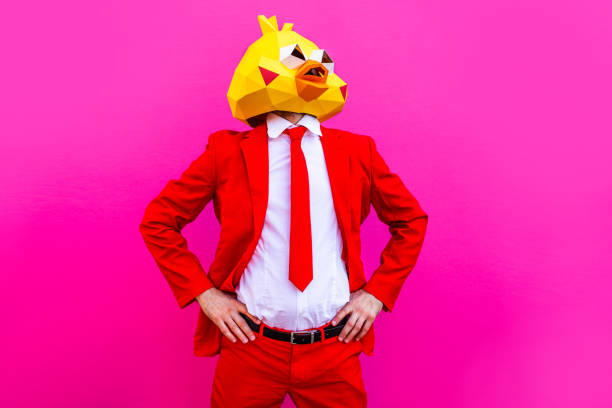 istock Cool man wearing 3d origami mask 1357098729