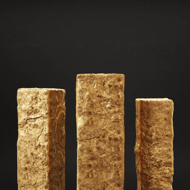 istock Golden stone slabs for display product. Isolated, clipping path included. 1357098794