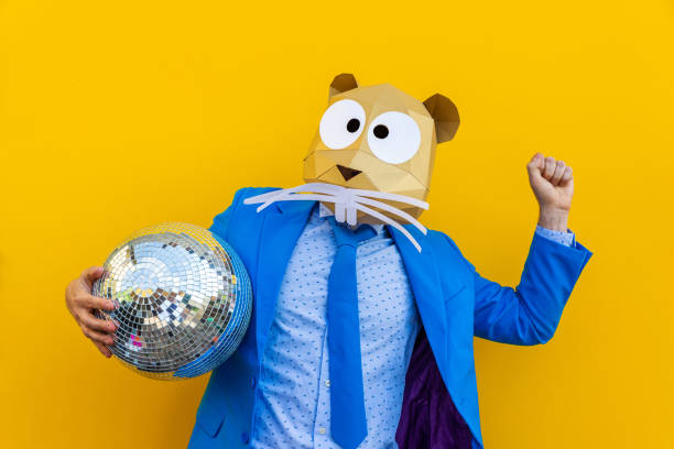 istock Cool man wearing 3d origami mask 1357099376
