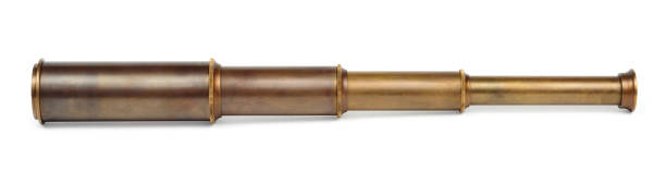 istock Ancient spyglass isolated on a white background. Clipping path included 1357099976