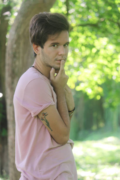 istock a young latin man in nature 1357103179