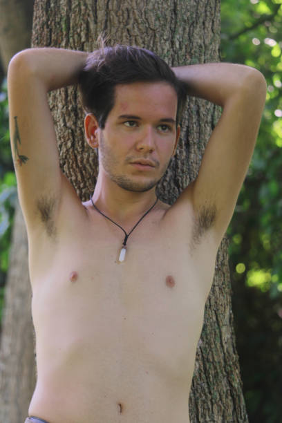 istock a young latin man in nature 1357103183