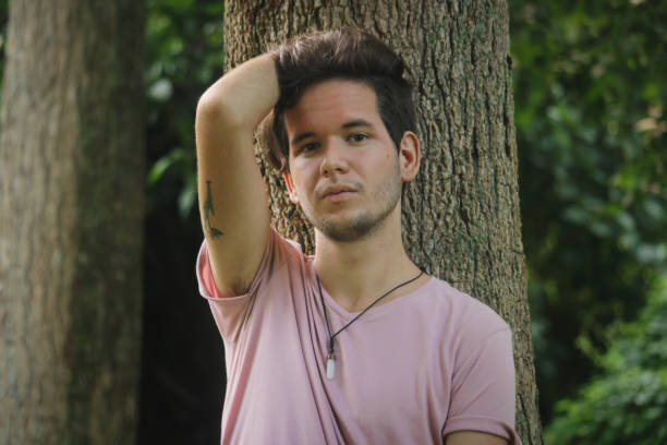 istock a young latin man in nature 1357103188