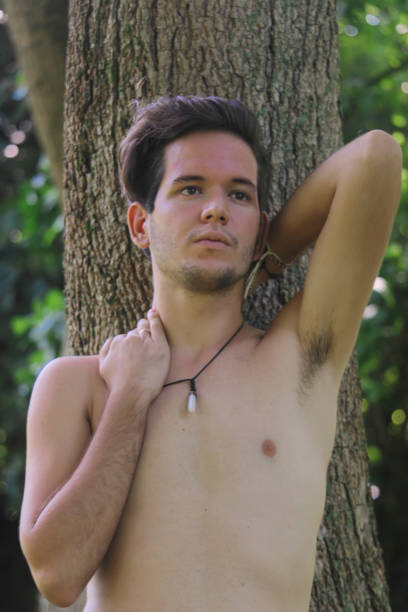 istock a young latin man in nature 1357103198