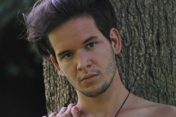 a young latin man in nature