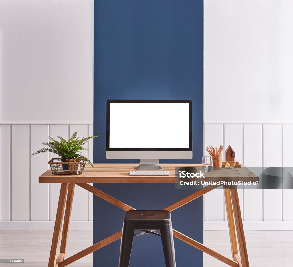 modern home interior study room and wooden desk modern home interior study room and wooden desk metal chair frame flower vase parquet floor Apartment Stock Photo