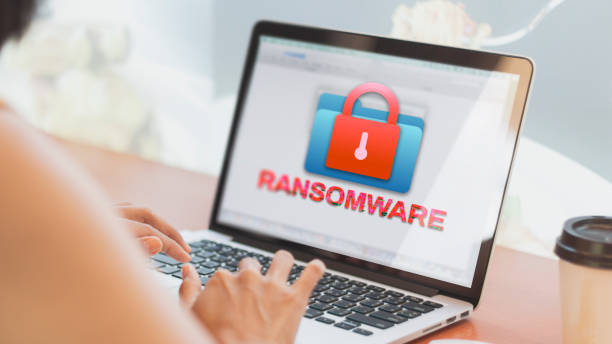 Ransomware malware on Laptop Ransomware on a laptop screen. Cyber Crime concept. ransomware stock pictures, royalty-free photos & images