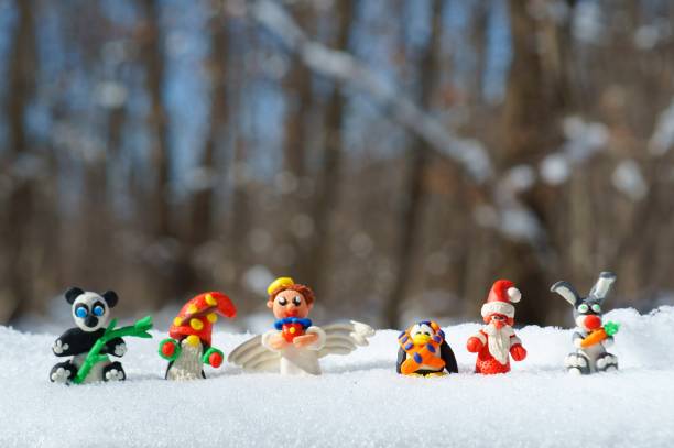 istock Fairy-tale figures of characters in the winter forest. 1357109964