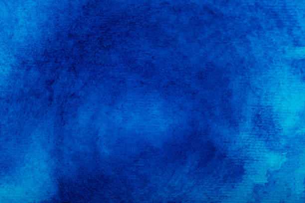 istock Watercolor blue background, texture  paper 1357111062