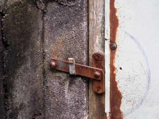 Rusty doorbolt of an old barn