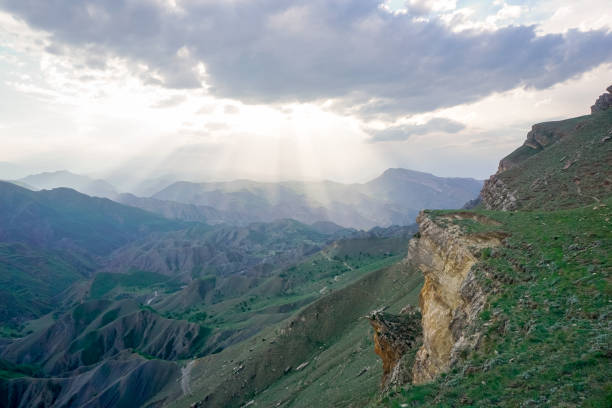 istock Sheer cliff of the mountain range at sunset 1357111817