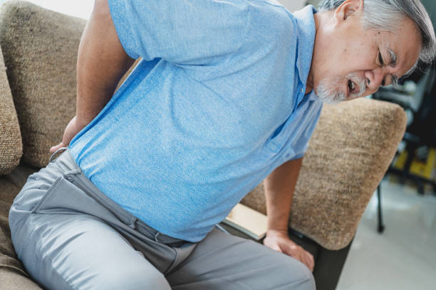 istock Mature asian man backache. 1357115491