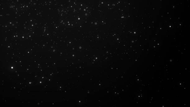 istock Dust particles moving in space. Abstract black cosmic background. 3d rendering. 1357117020
