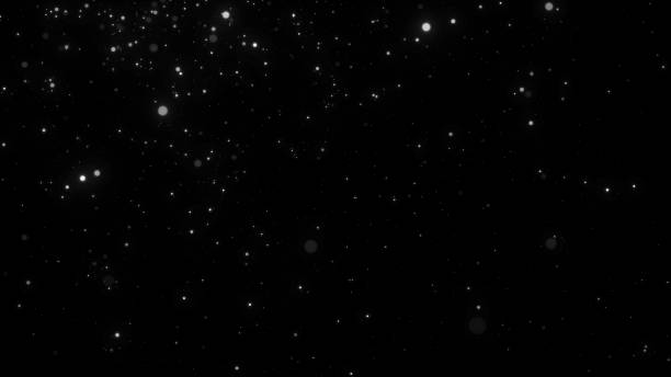 istock Dust particles moving in space. Abstract black cosmic background. 3d rendering. 1357117022