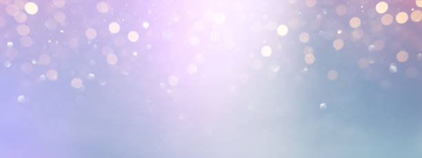 istock glitter vintage lights background. purple, silver and gold. de-focused 1357117268