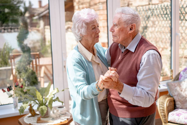 istock A senior couple is dancing at home for some fun exercise 1357117896