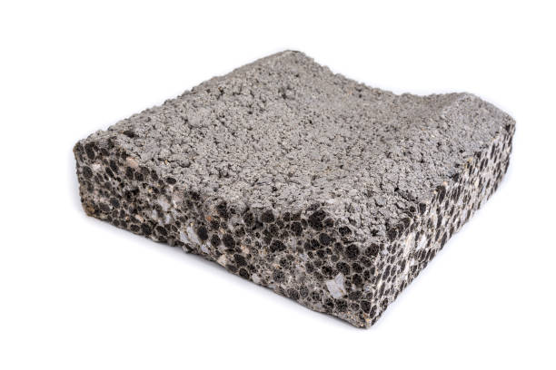 istock Cut lightweight concrete pieces from a blocks on a white 1357120658