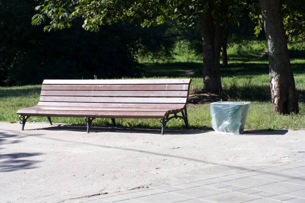 istock bench  in park at dry sunny summer day 1357125264