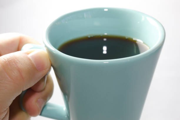 istock Ocean green coffee cup with white background. 1357126995