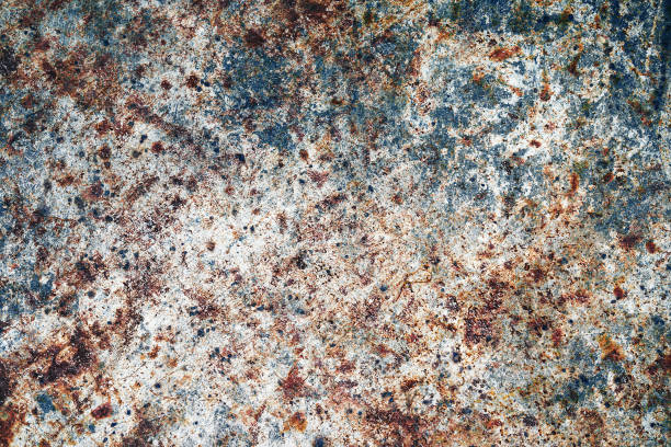 istock Grunge rust background. Scratched metal texture. Peeling paint background. White rusty brushed iron sheet. Cracked steel pattern. 1357127180