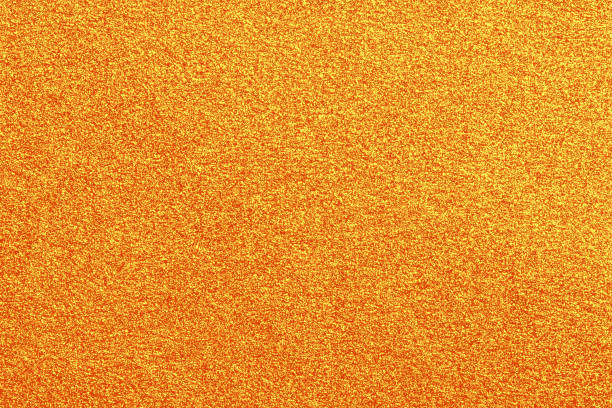 istock Golden grain texture. Yellow glitter background. 1357127715