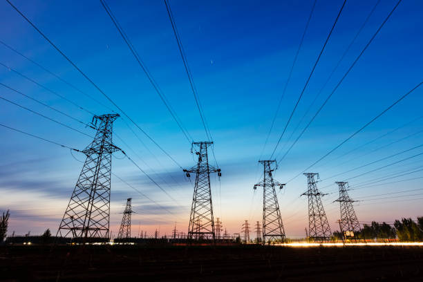 istock Pylons, high voltage pylons in the evening 1357127878