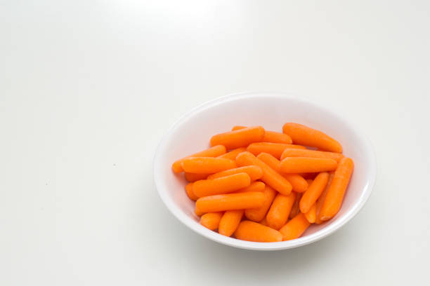 istock Baby Cut Carrots In Bowl 1357130487