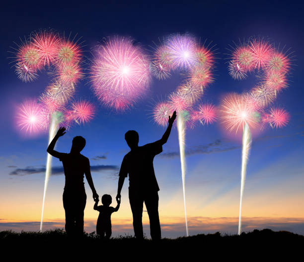 istock family with 2022 fireworks 1357135067