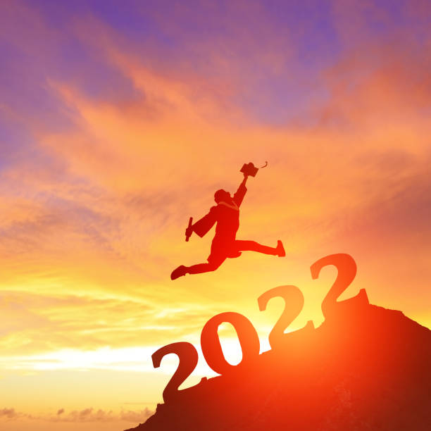 istock graduate student jump over 2022 1357135332