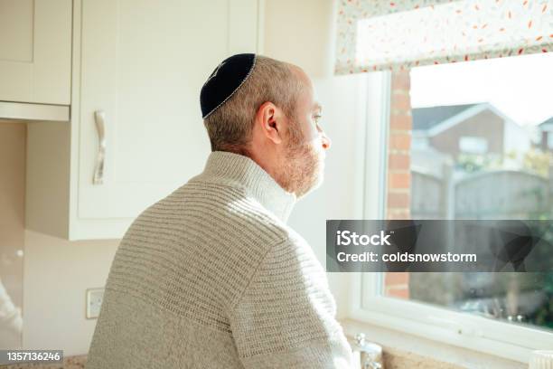 Jewish Man Wearing Skull Cap At Home Stock Photo - Download Image Now - 30-39 Years, 35-39 Years, Adult