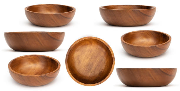 Empty wooden bowls isolated on white background. Set of wood bowls. Collection. stock photo