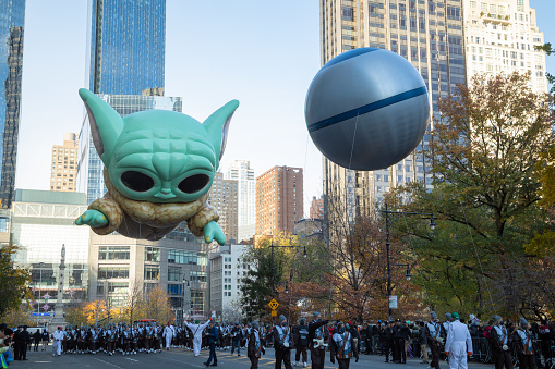 New York City, NY- November 25, 2021: Grogu balloon makes its debut during the 95 annual Macy's Thanksgiving Day Parade.