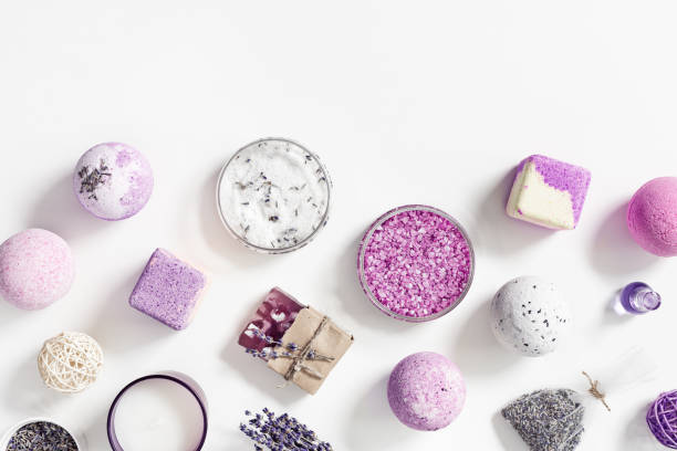 Natural Lavender essential fragrant aromatherapy, bath bomb, soap, bottle essential oil, jar with sea salt. Lavender Herbal medicine, natural cosmetic for body treatment, Health and self-care