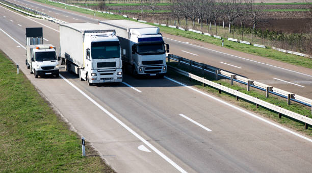 istock Trucks on the highway. 1357151018
